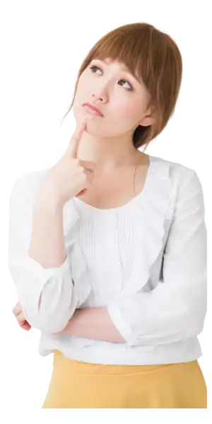 人差し指を顎に当て、考え事をしている女性